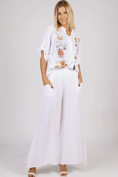 Bluzka dekolt guziki kwiaty napisy